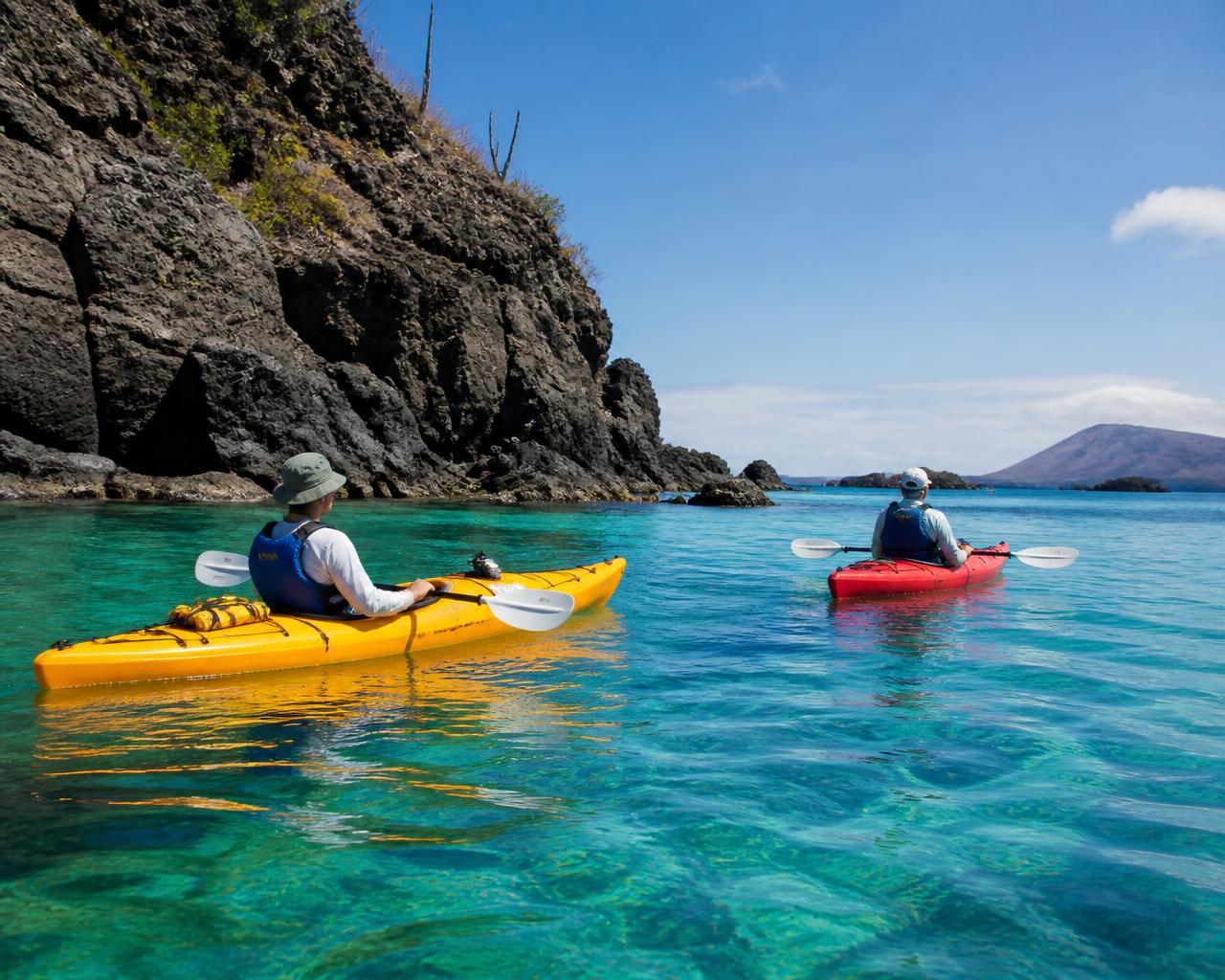 Kayakers in a turquoise bay